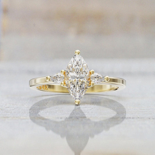 10K 1Ct. Marquise Cut Moissanite Three Stone Engagement Ring